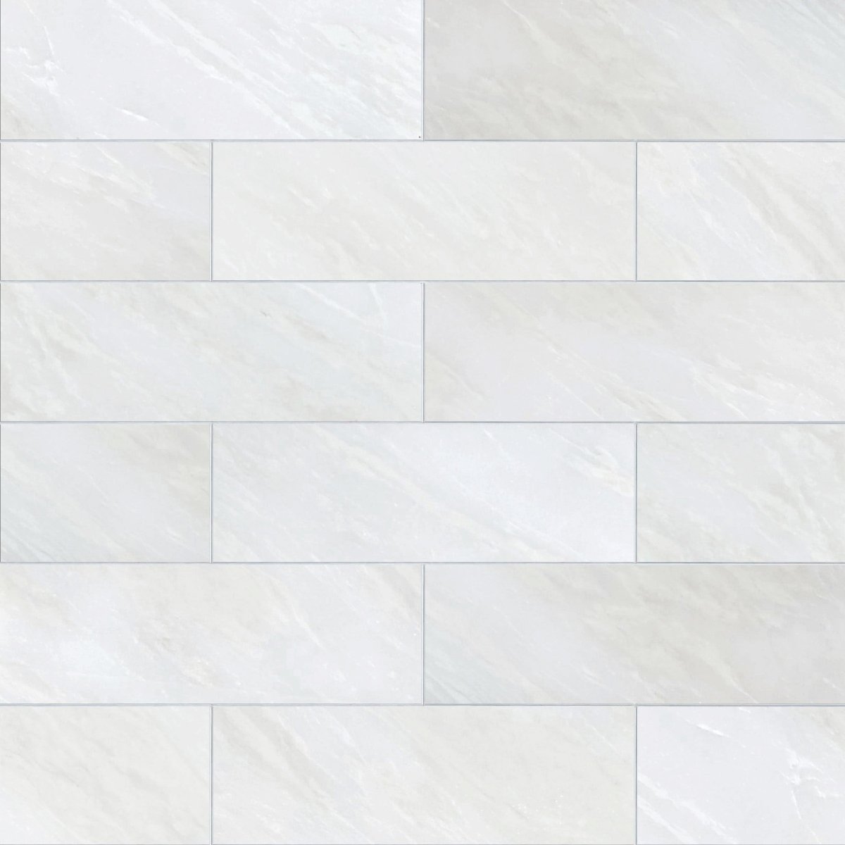 White tiles arranged in a herringbone pattern on a white background