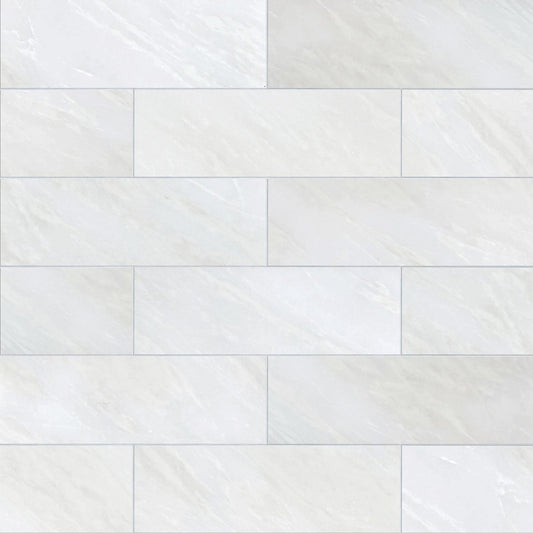 White tiles arranged in a herringbone pattern on a white background