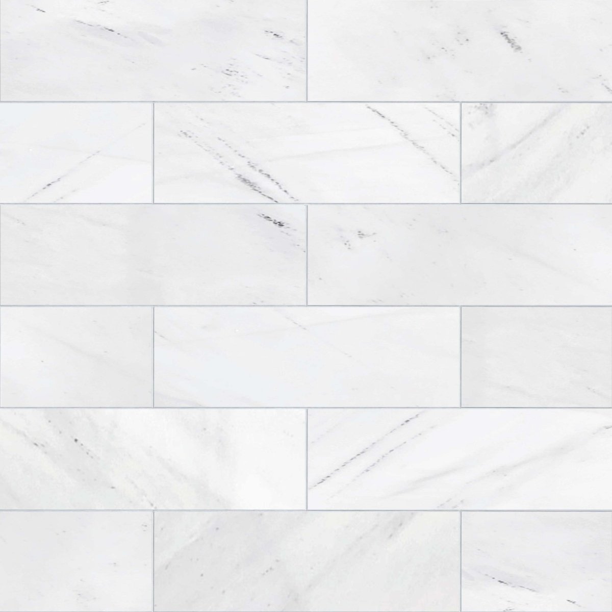 White marble tiles arranged in a herringbone pattern