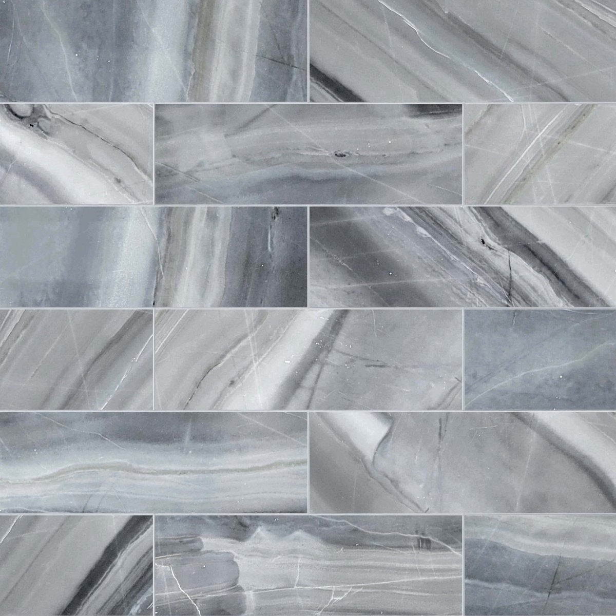 Collage of gray marble tiles with various veining patterns