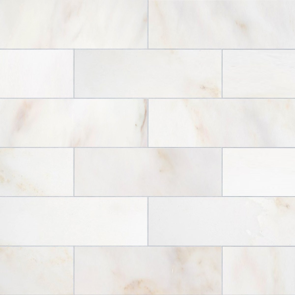 White marble tiles with subtle gray veining