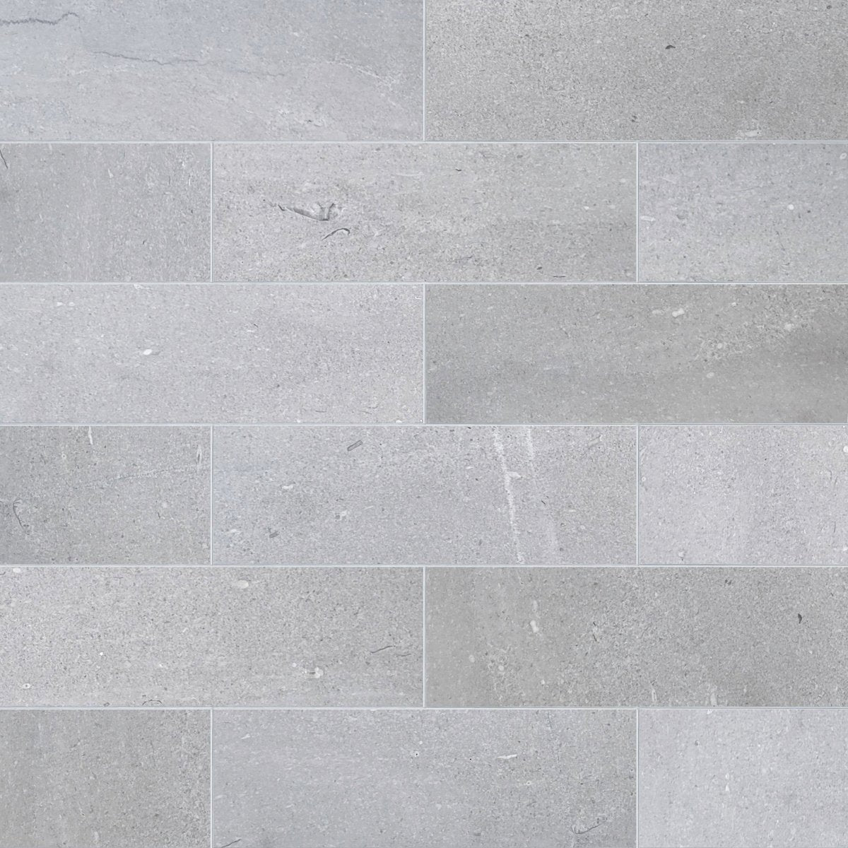 Pattern of gray tiles with a subtle texture
