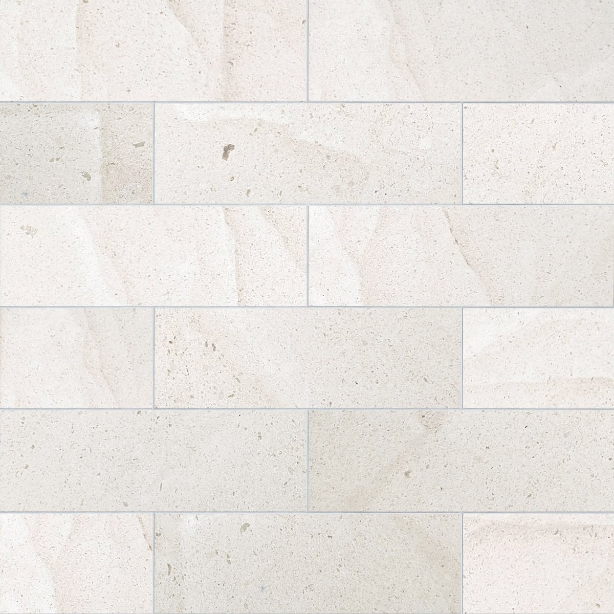 Pattern of light gray tiles with a subtle texture