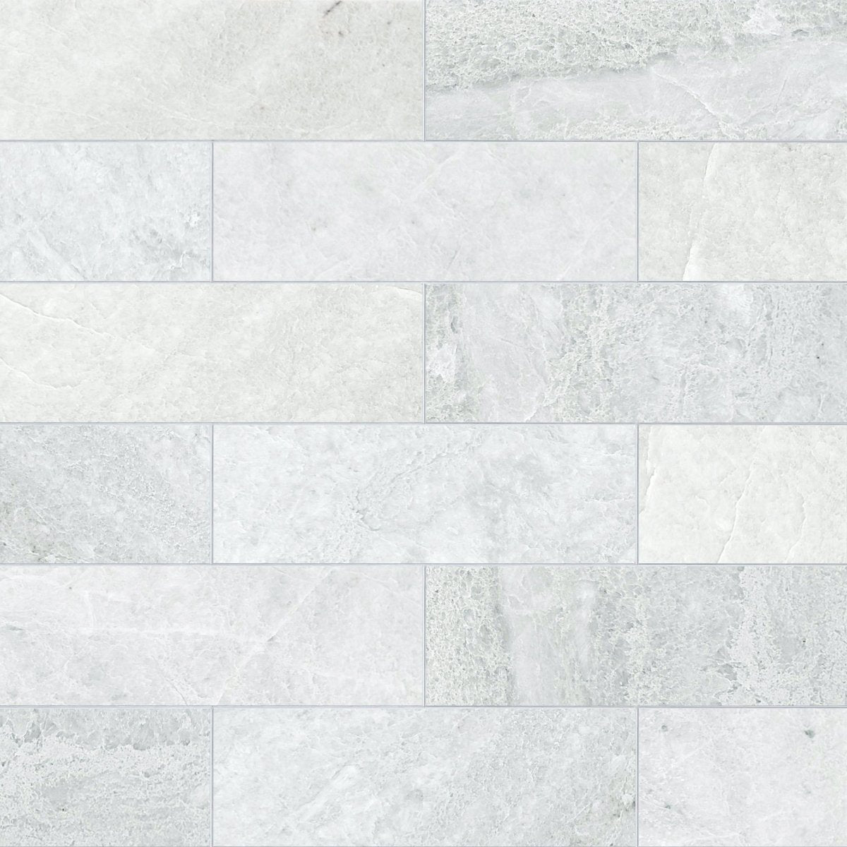 White marble tiles with a subtle pattern