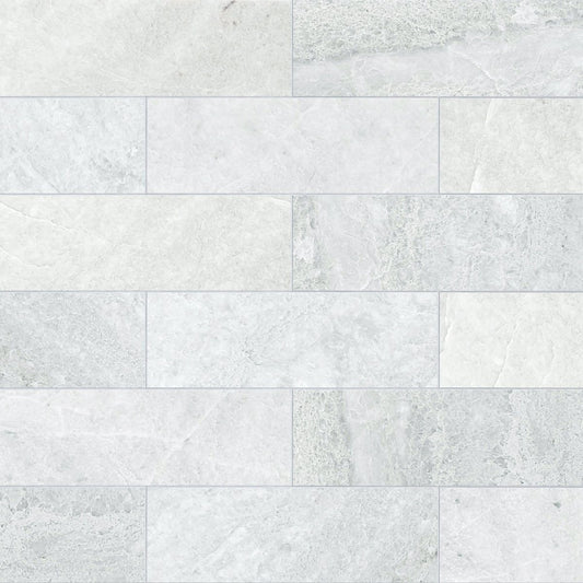 White marble tiles with a subtle pattern