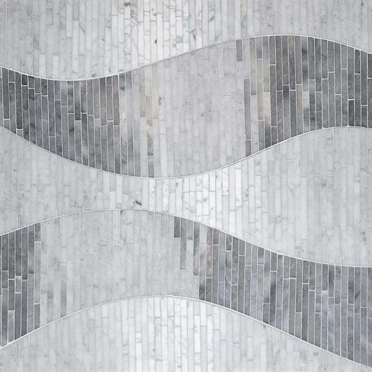 Gray mosaic tile pattern with wavy lines on a textured background