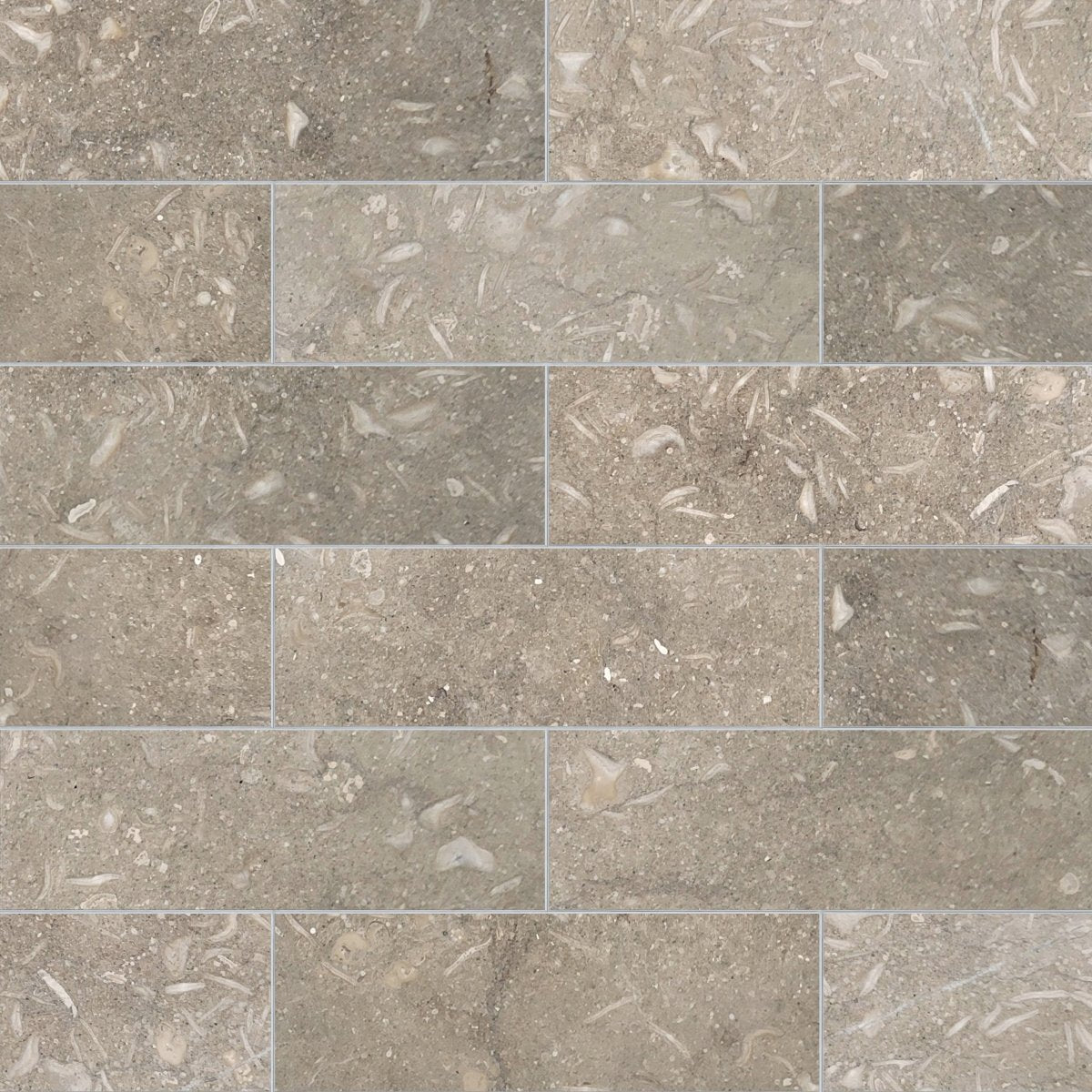 Pattern of gray tiles with a textured surface