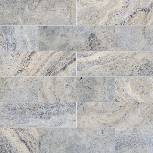 Pattern of gray and beige tiles with a marble-like texture.