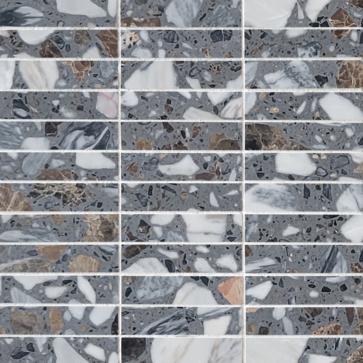 Patterned tile with gray, white, and brown colors arranged in a grid.