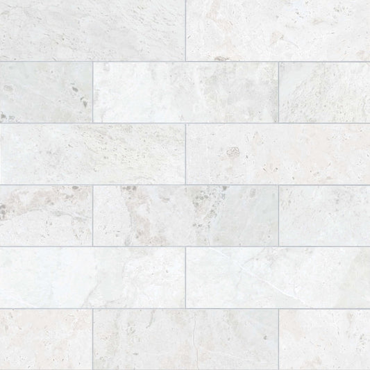 White marble tiles with a subtle pattern